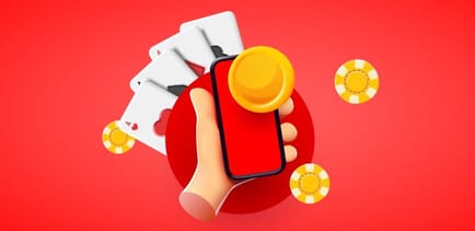 Kännykkä, kolikoita ja kortteja